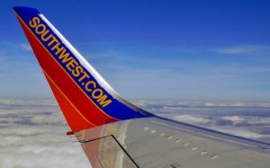 Tip of Southwest Airlines airplane in sky